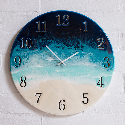 resin wall clock art with cut out numbers by Australian artist