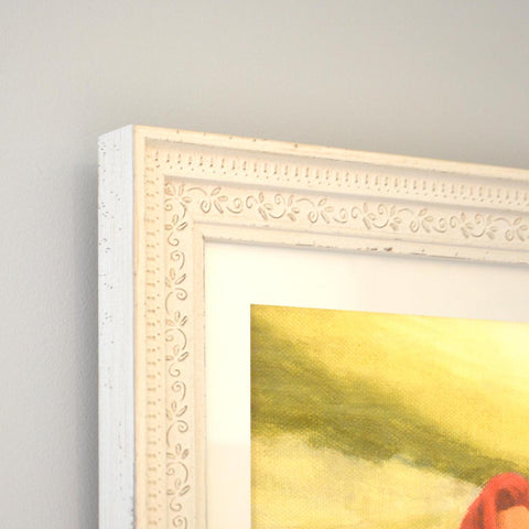 white frame with vibrant coloured wall art of elegant mermaid in full length